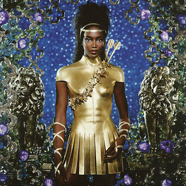 NAOMI CAMPBELL models Gold Centurian Breastplate made by Whitaker Malem for Alexander McQueen’s first couture collection for Givenchy in 1997 (photo: Pierre et Gilles)